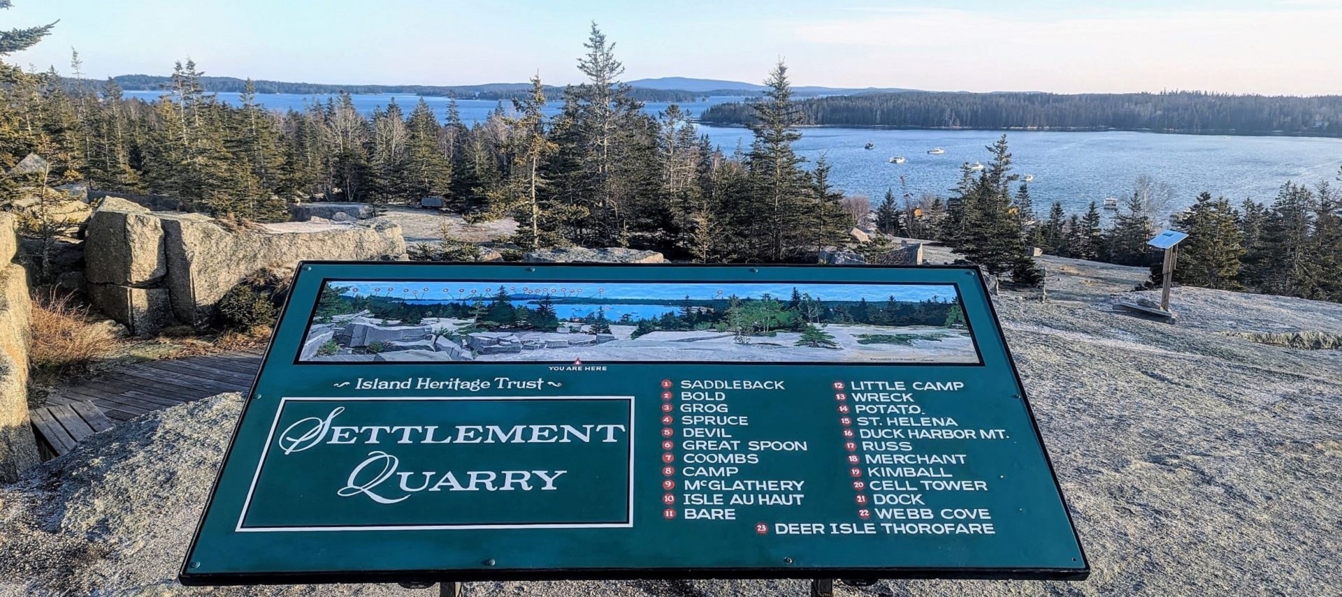 Settlement Quarry sign overlooking ocean